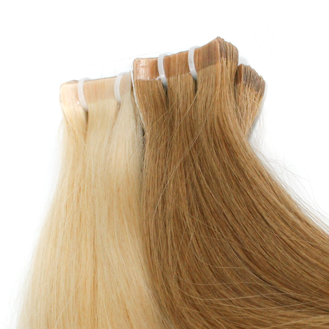 Tape-ins hair extensions. Dark and light blonde hair tapes.