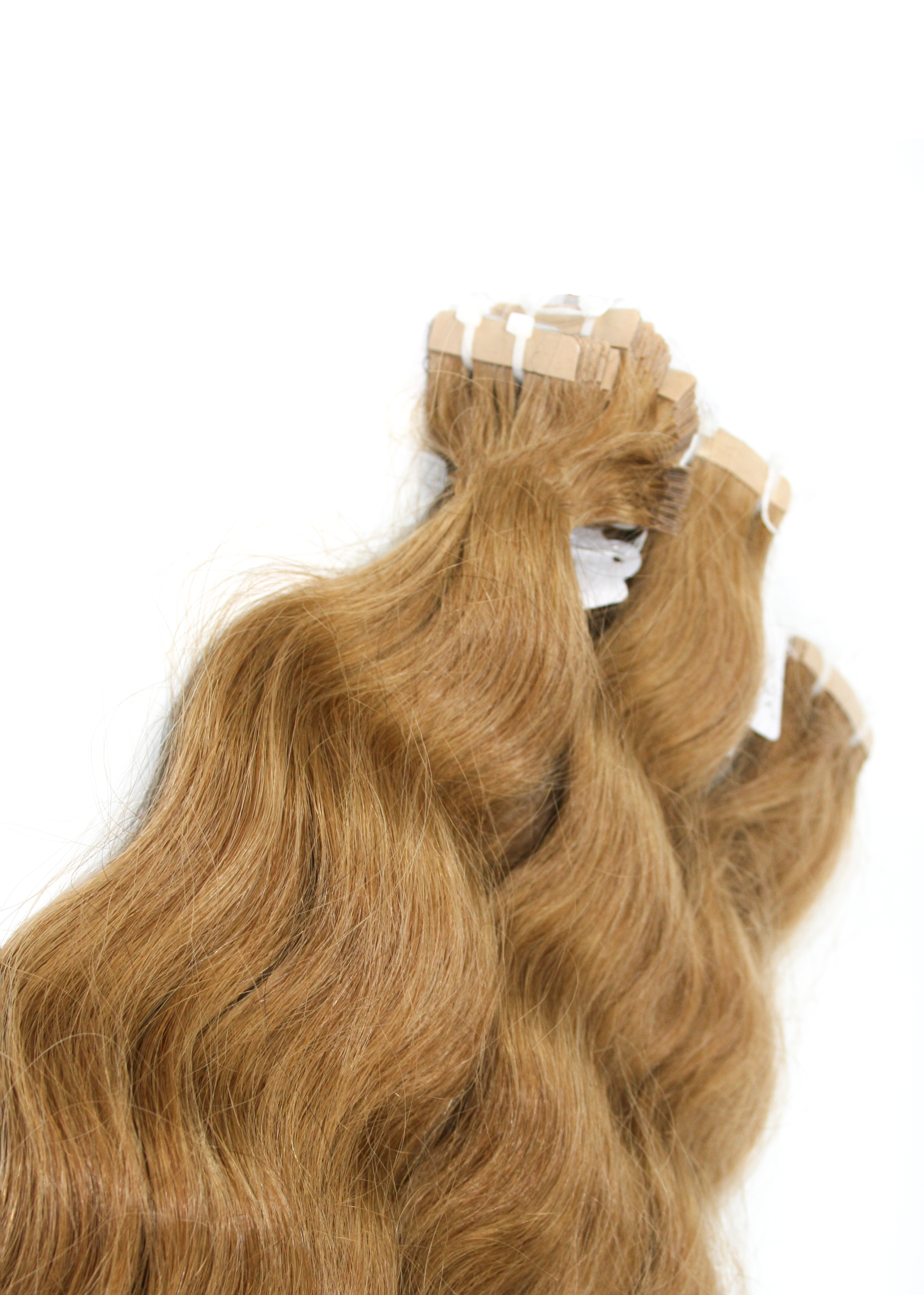 Blonde tape-ins hair extensions. Blonde natural wavy hair extensions.